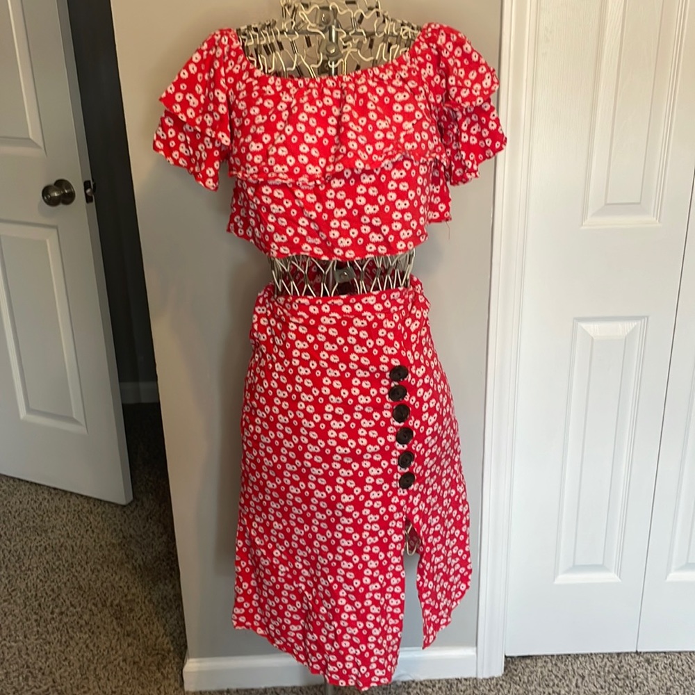 Small Miss Selfie crop top with skirt. Red with floral pattern.
